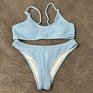 Blue bikini. In original packaging! Never worn, only tried on. Very flattering!